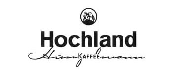 Hochland Das Logo von Hochland Kaffee zeigt die Silhouette einer Bergziege über dem Markennamen in Fettdruck und darunter KAFFEE und Schreibschrift.